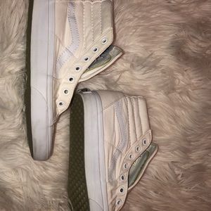 White vans, no laces.